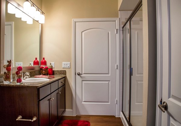 Modern bathroom with sleek fixtures at Retreat at the Woodlands Apartments