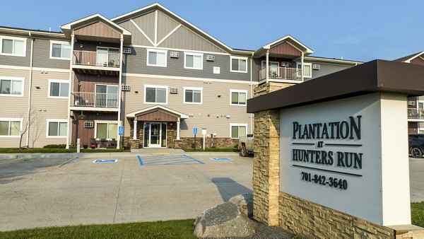 building/exterior at Plantation at Hunters Run Apartments