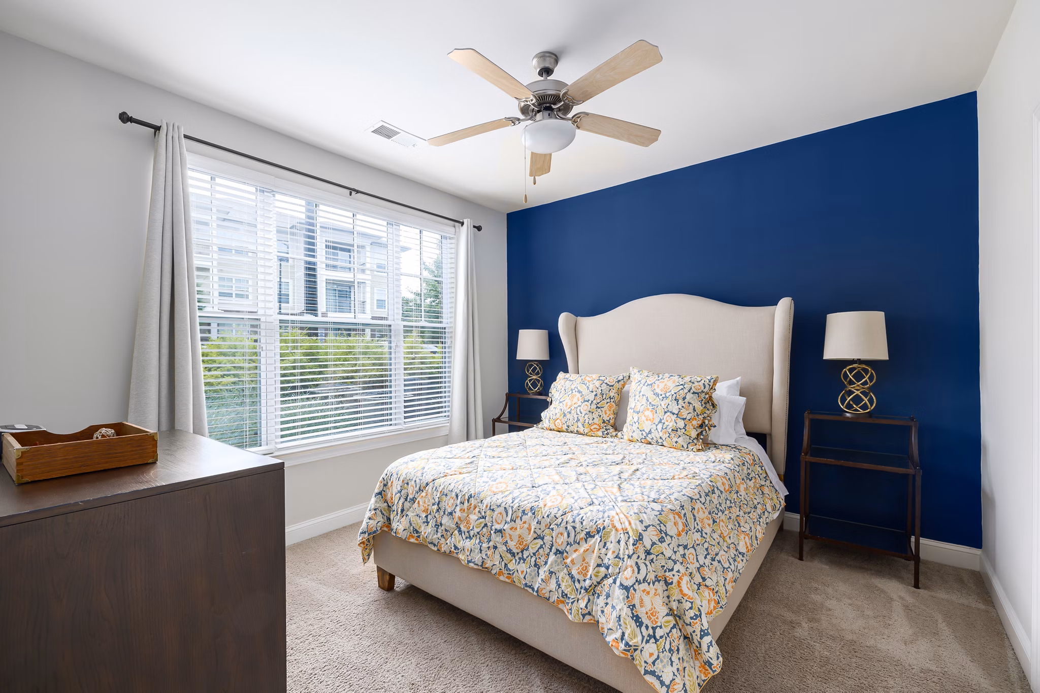Cozy bedroom with modern decor and ample natural light at Parkside Place Apartments