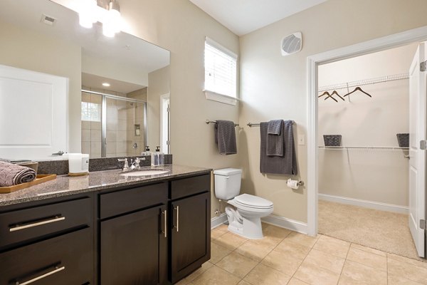 Spacious bathroom with modern fixtures at Parkside Place Apartments