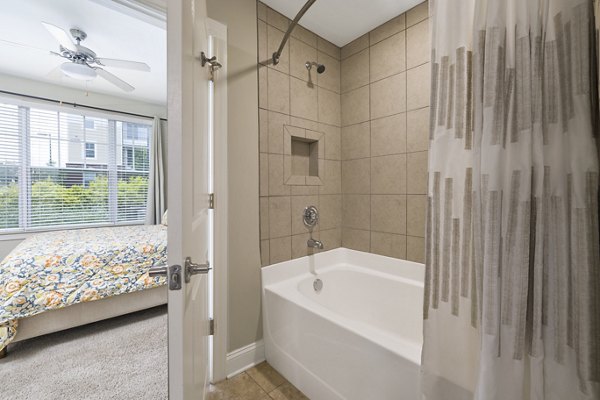 Modern bathroom with sleek fixtures at Parkside Place Apartments, a premium offering in the Greystar luxury apartments lineup