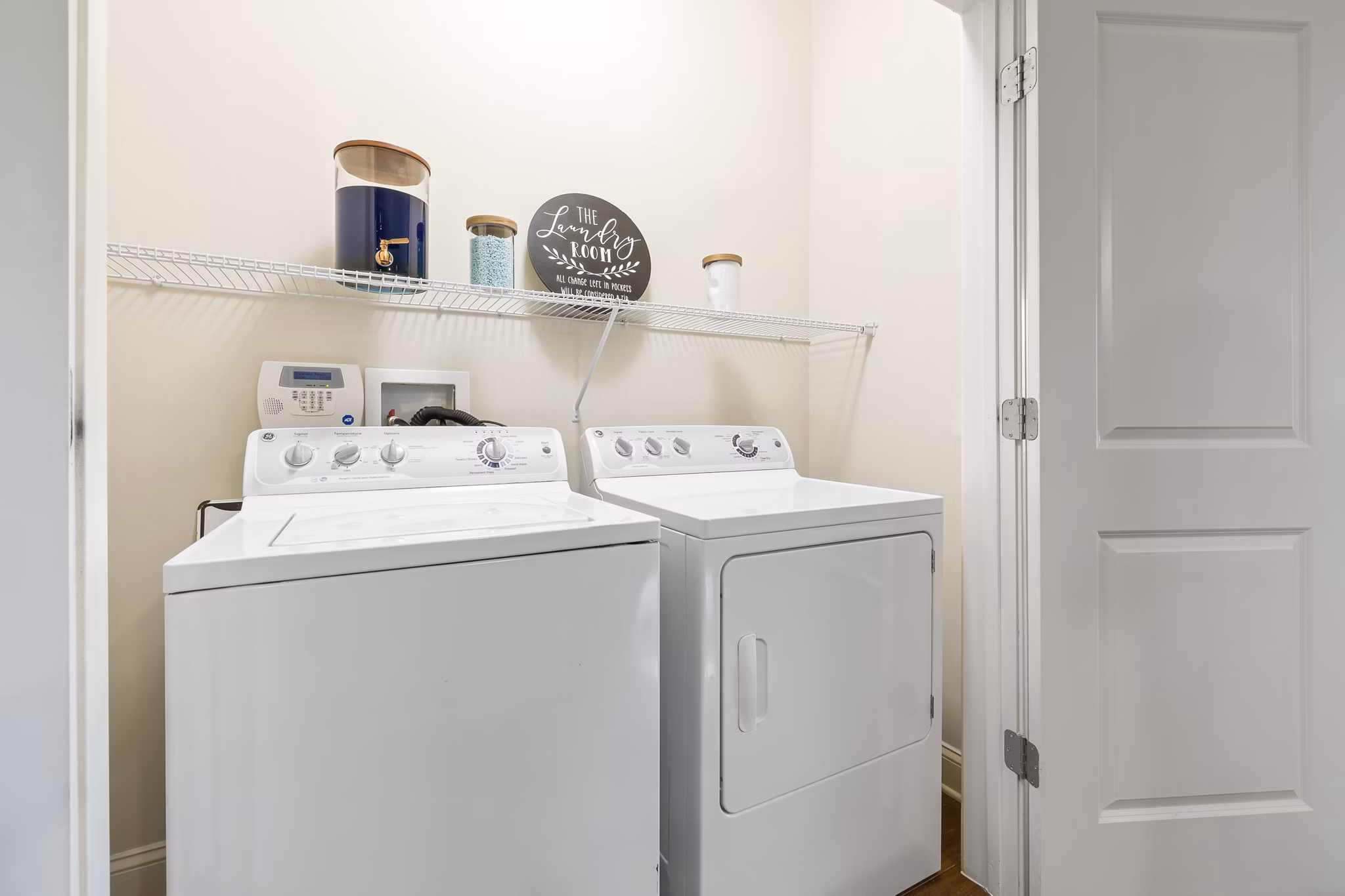 Laundry room with energy-efficient washers and dryers at Parkside Place Apartments