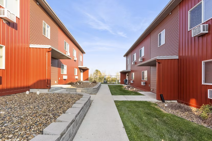 Creekstone Twin Homes: Contemporary design of luxury duplex apartments in suburban neighborhood