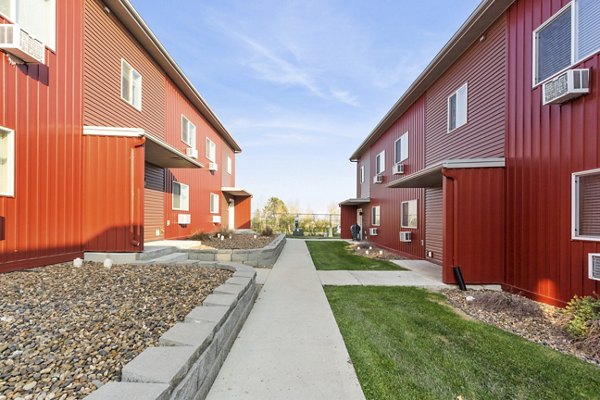 Creekstone Twin Homes: Contemporary design of luxury duplex apartments in suburban neighborhood