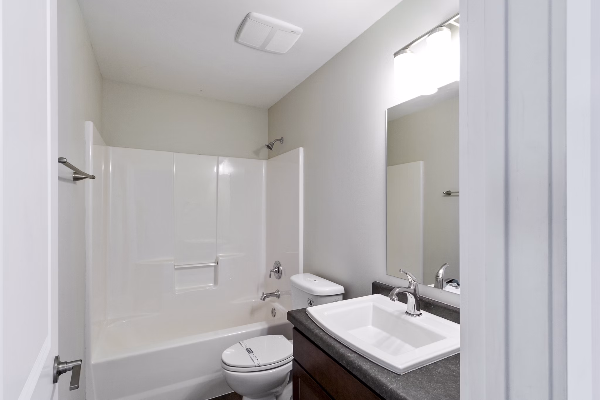 Luxury bathroom with marble countertops and elegant fixtures in Creekstone Twin Homes
