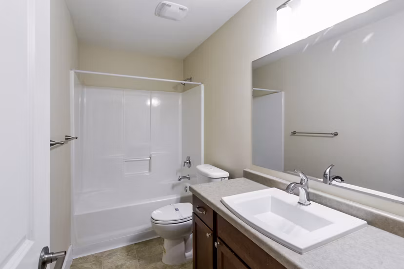 Modern bathroom with elegant fixtures in Creekstone Twin Homes