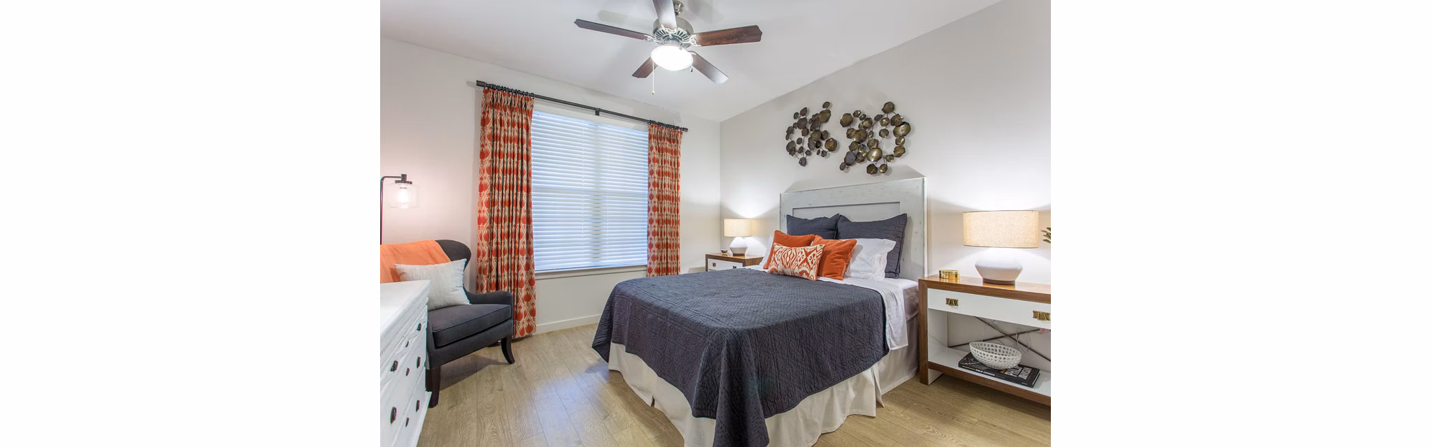 Cozy bedroom with modern decor at Dalian Monterrey Village Apartments