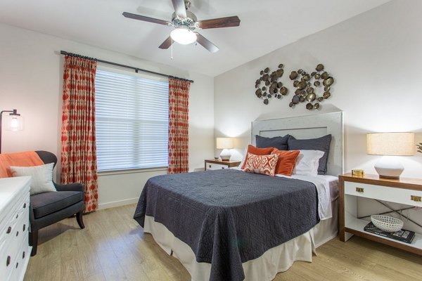 Cozy bedroom with modern decor at Dalian Monterrey Village Apartments