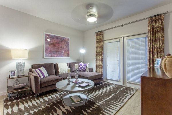 Spacious living room with elegant decor at Dalian Monterrey Village Apartments