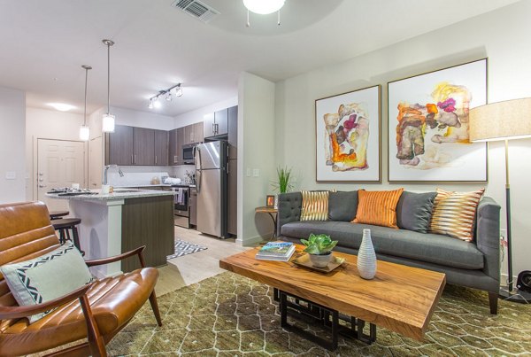 Inviting living room with modern furnishings at Dalian Monterrey Village Apartments