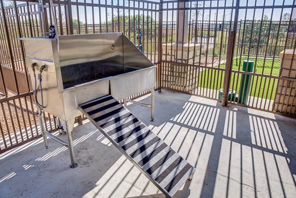 Dog wash station at Dalian Monterrey Village Apartments with modern grooming facilities for pet-friendly living
