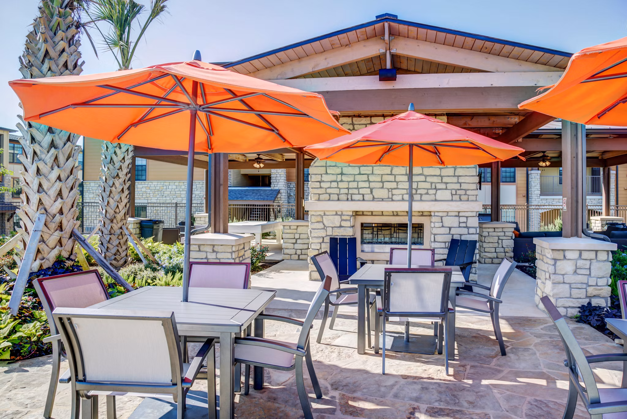 Spacious patio with outdoor seating at Dalian Monterrey Village Apartments, offering luxury outdoor living spaces in a vibrant community