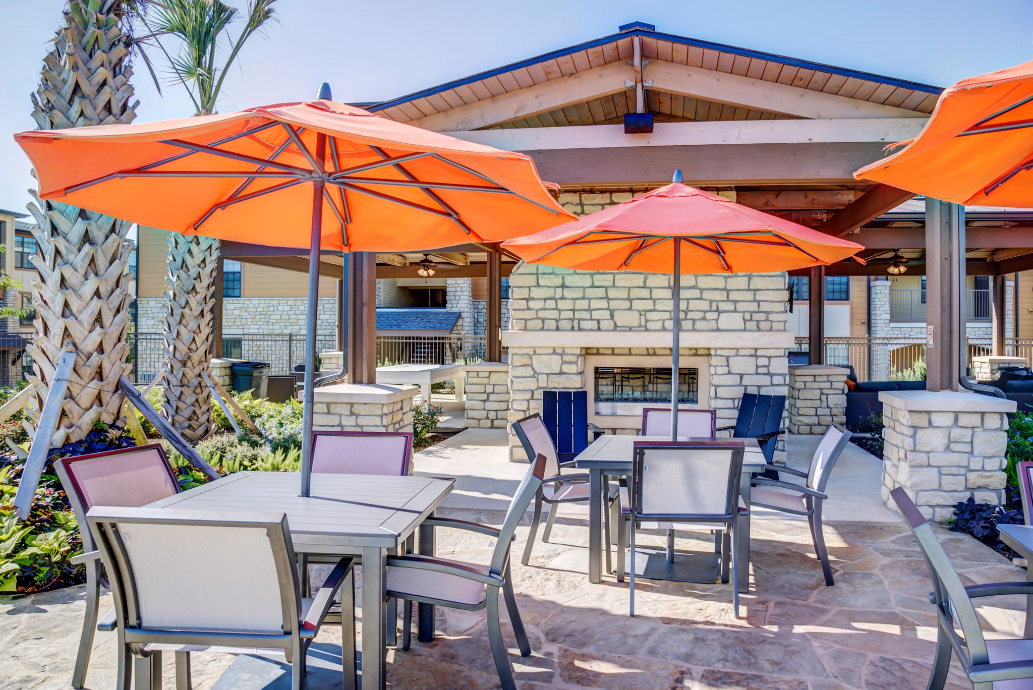 Spacious patio with outdoor seating at Dalian Monterrey Village Apartments, offering luxury outdoor living spaces in a vibrant community