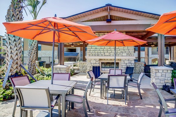 Spacious patio with outdoor seating at Dalian Monterrey Village Apartments, offering luxury outdoor living spaces in a vibrant community
