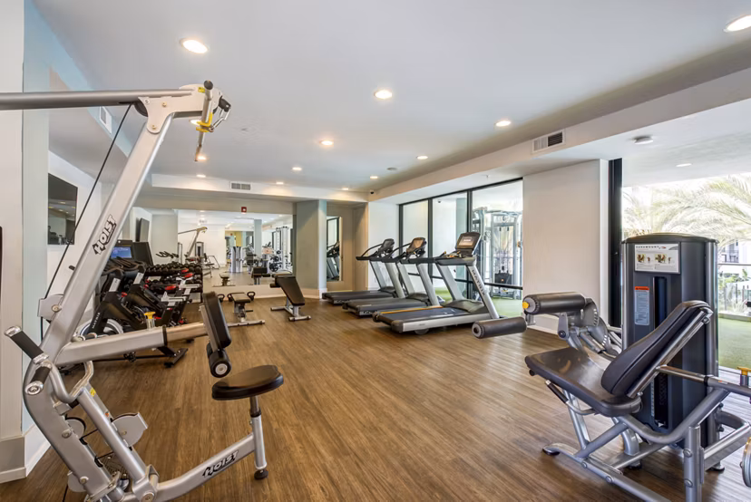 Modern fitness center with state-of-the-art equipment at Accent Apartments