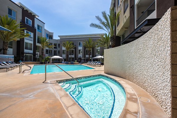 Relaxing hot tub at Accent Apartments providing luxury amenities for residents to unwind and enjoy a serene setting