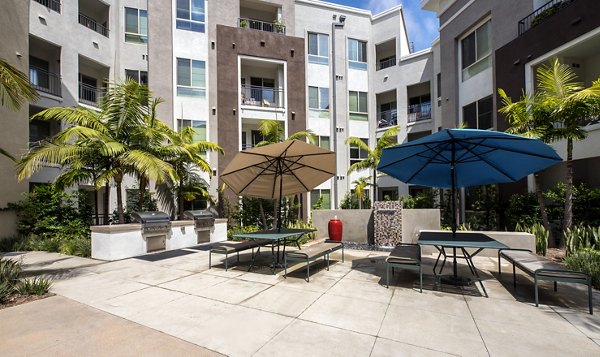 Modern outdoor grill area at Accent Apartments, ideal for social gatherings and weekend BBQs in a luxury setting