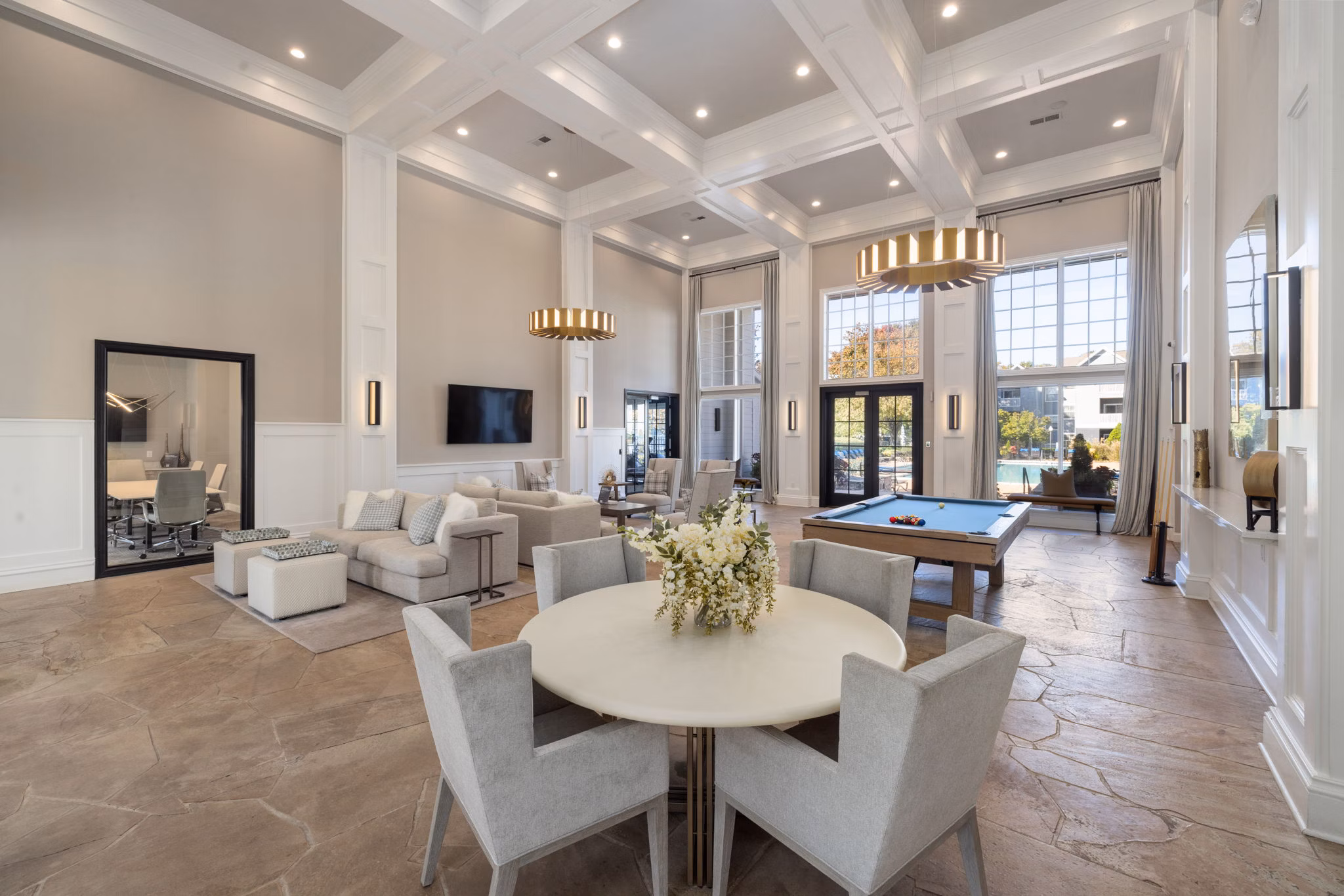 Clubhouse featuring luxurious seating and modern decor at The Riley Apartments