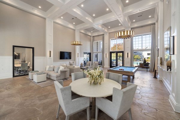 Clubhouse featuring luxurious seating and modern decor at The Riley Apartments