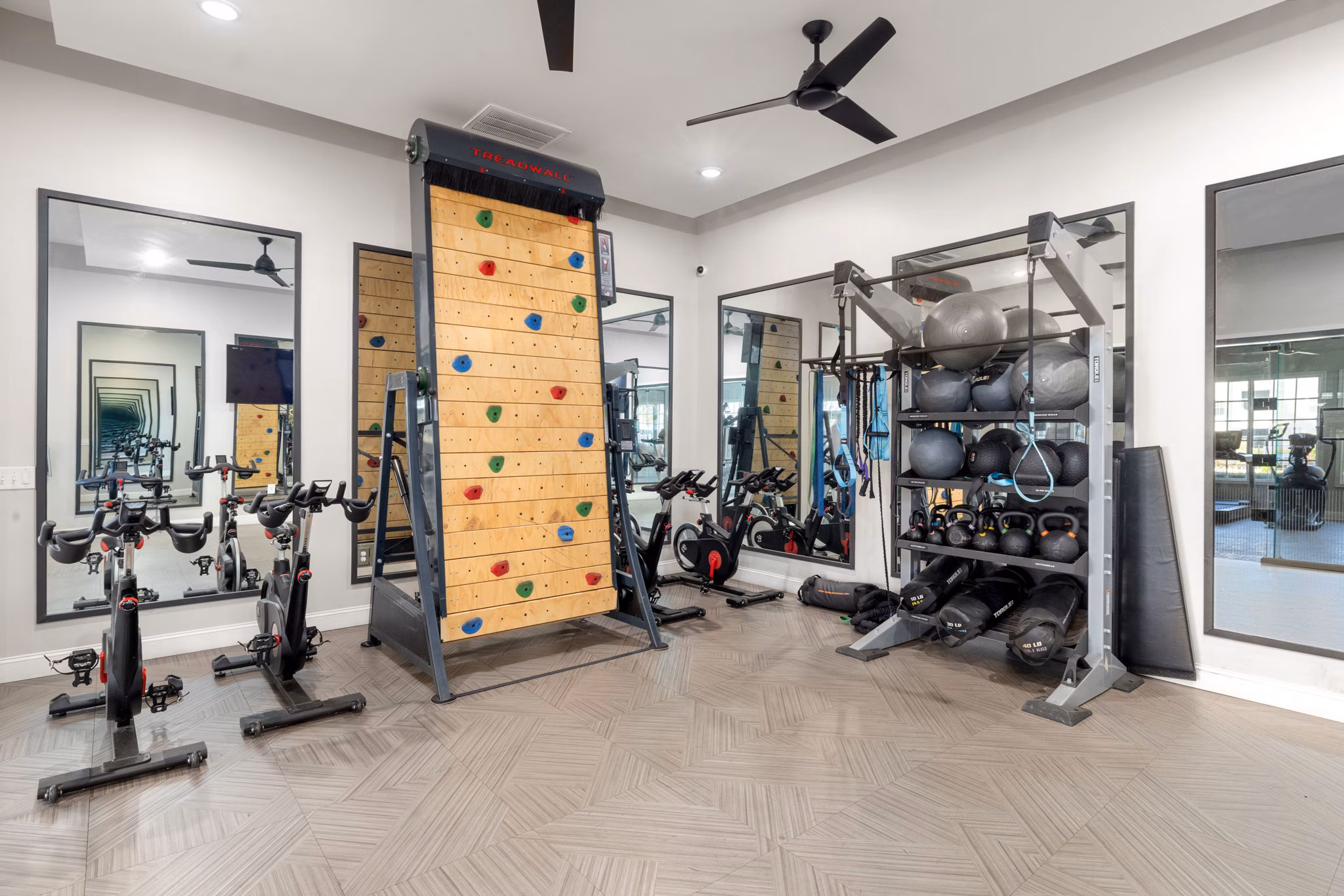 Fitness center with state-of-the-art equipment at The Riley Apartments