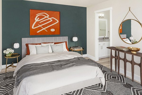 Cozy bedroom with contemporary decor at Arbor Heights Apartments, perfect for relaxing in style