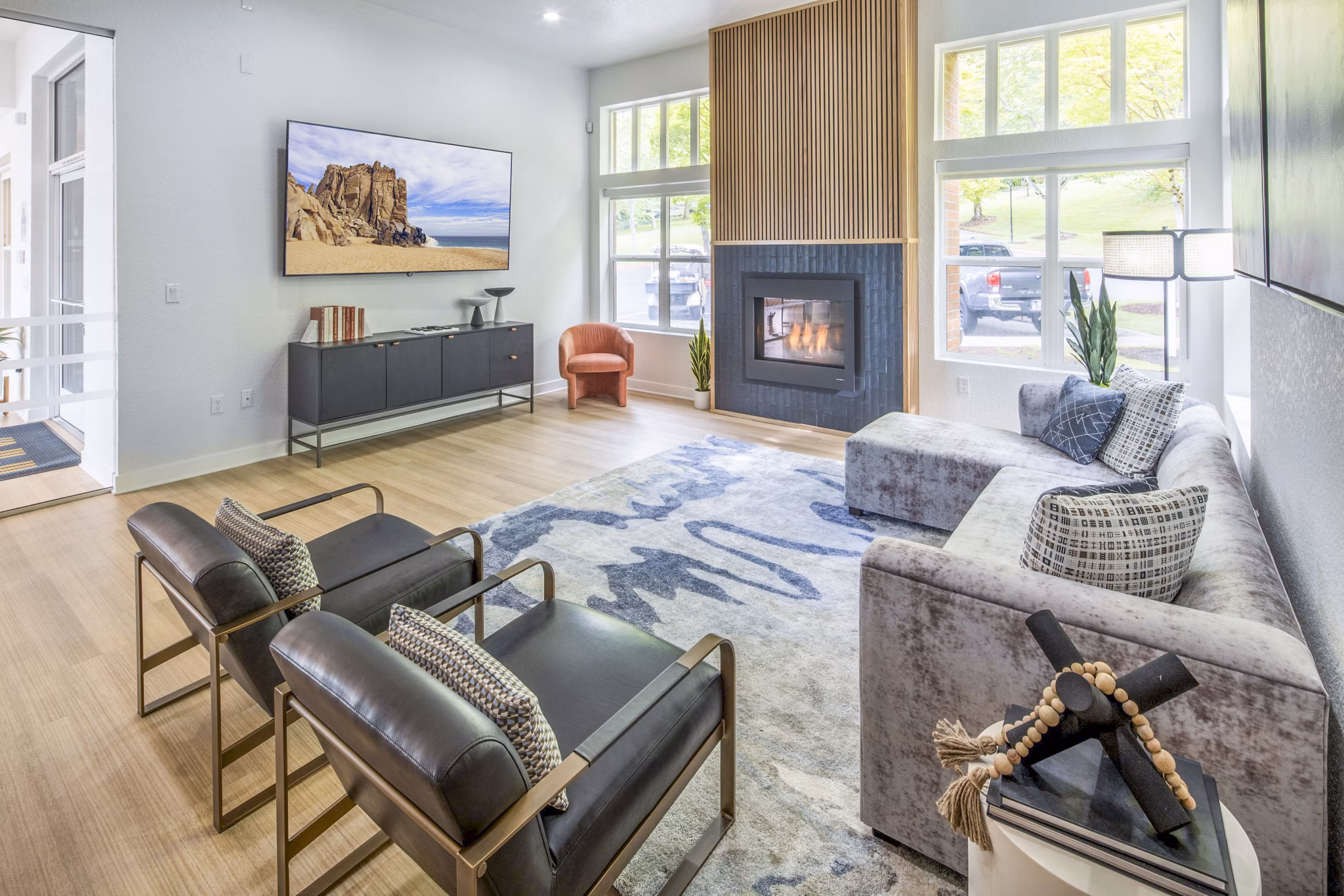 Clubhouse at Arbor Heights Apartments: Modern lounge spaces with cozy seating and a billiard table