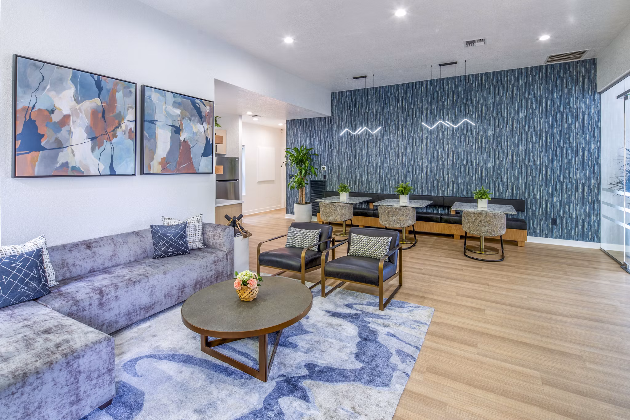 Clubhouse featuring modern design and cozy seating at Arbor Heights Apartments