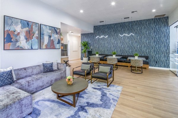 Clubhouse featuring modern design and cozy seating at Arbor Heights Apartments