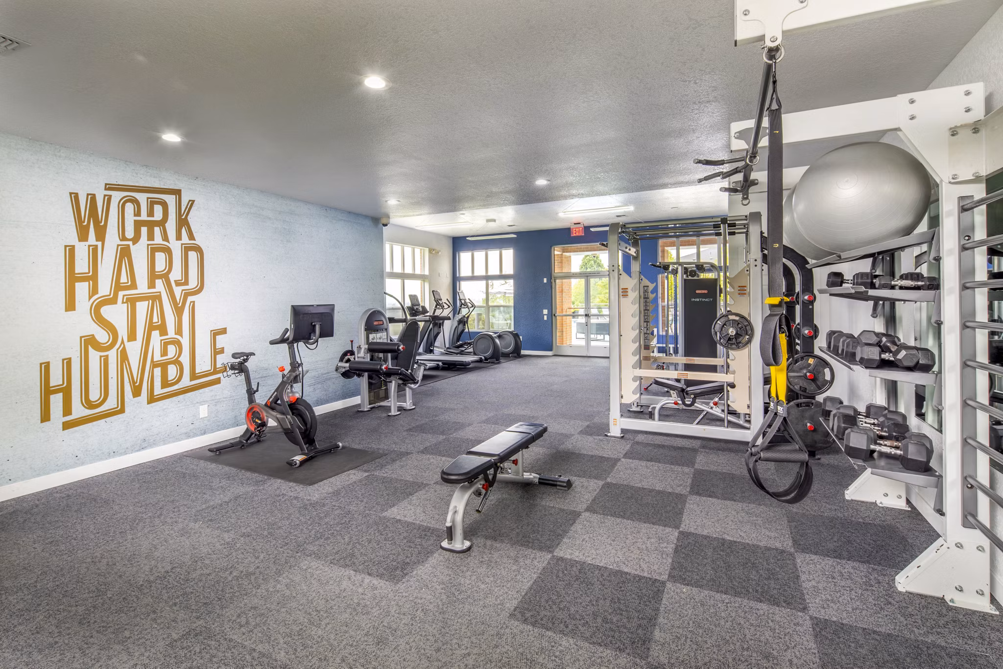 State-of-the-art fitness center at Arbor Heights Apartments offering modern equipment and vibrant workout spaces for residents
