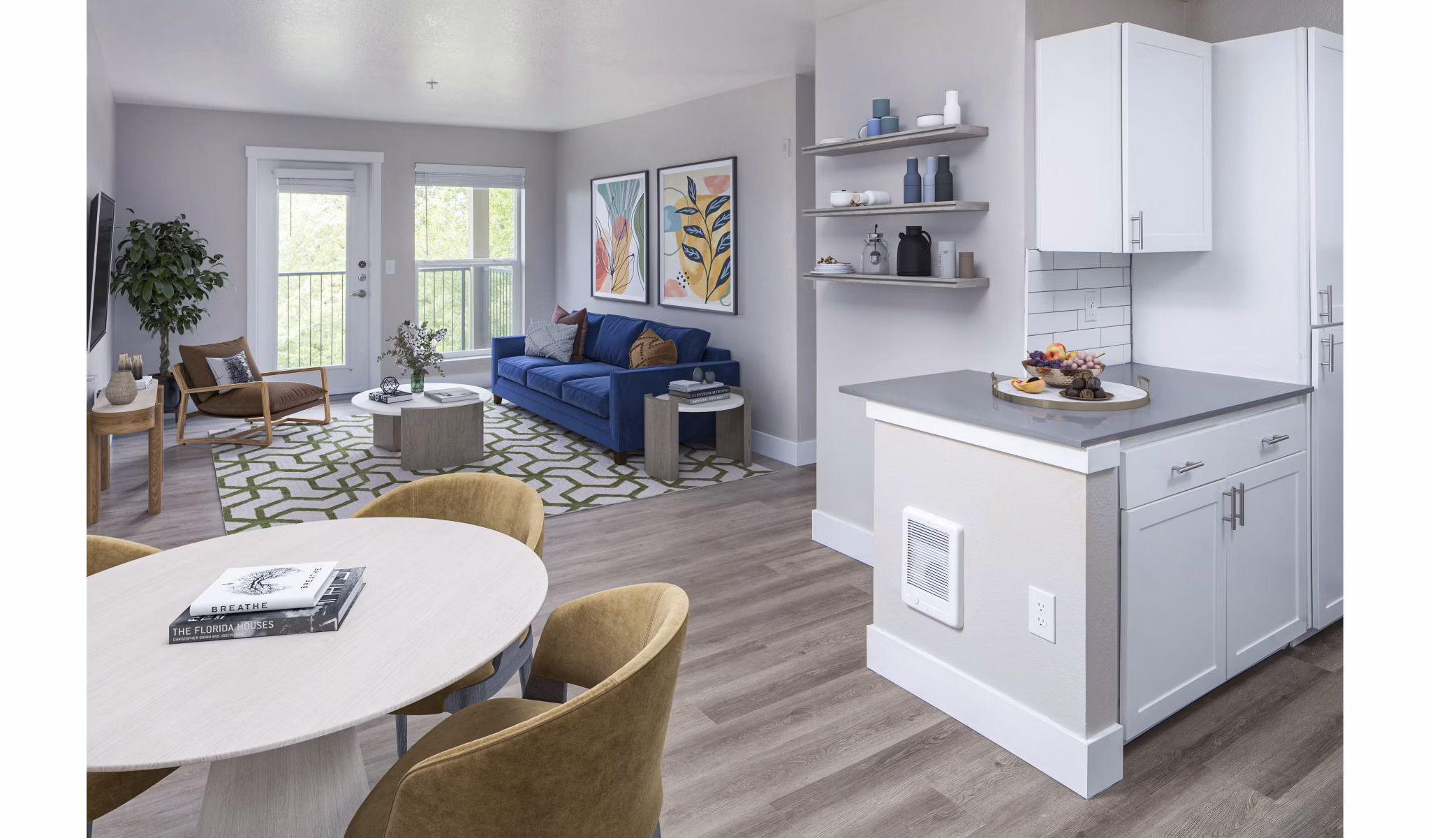 Living room featuring modern furniture and natural light at Arbor Heights Apartments