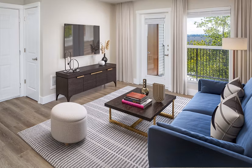 Living room with modern decor and natural light at Arbor Heights Apartments