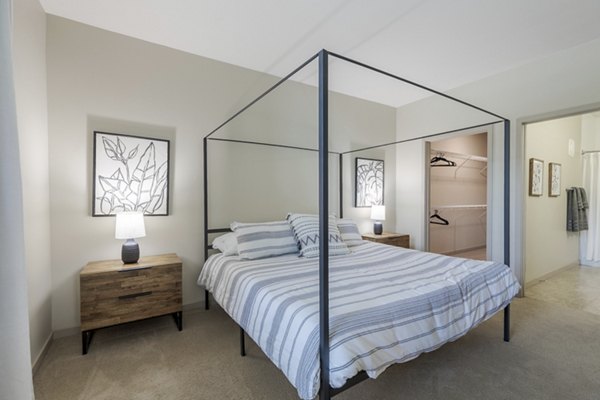 Modern bedroom with stylish decor at Outlook Littleton Apartments