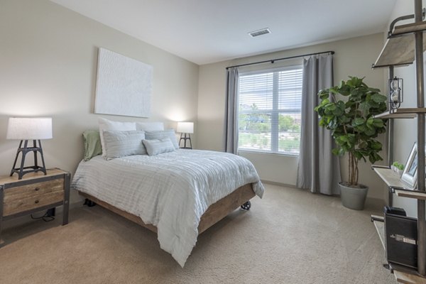 Cozy bedroom featuring contemporary decor at Outlook Littleton Apartments