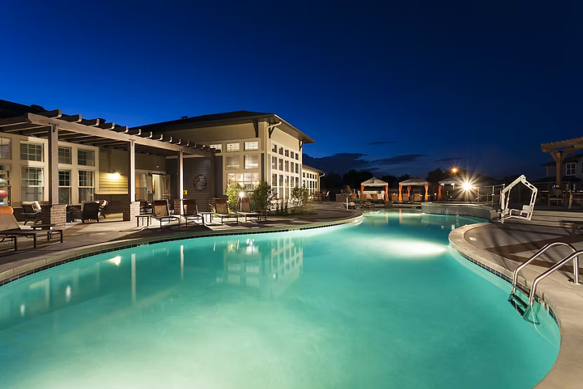 Rooftop pool with mountain views at Outlook Littleton Apartments