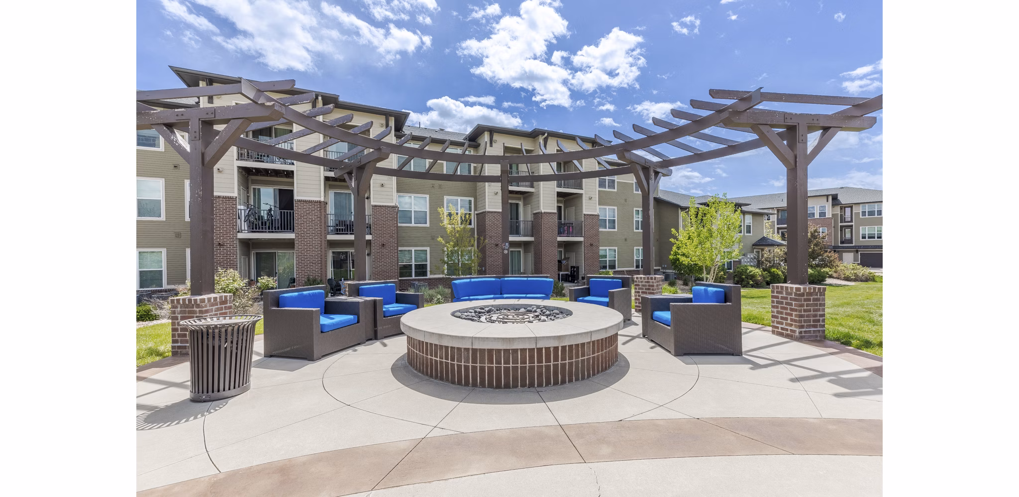 Cozy fire pit area at Outlook Littleton Apartments, perfect for relaxation and social gatherings, showcasing luxury living