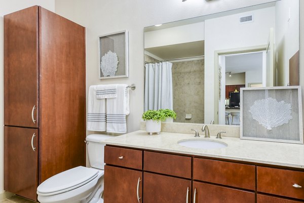 Modern bathroom with sleek fixtures at Artessa at Quarry Village Apartments