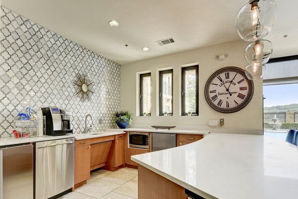 Modern clubhouse featuring stylish seating and vibrant dÃ©cor at Artessa at Quarry Village Apartments