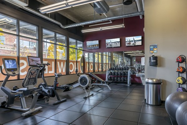 State-of-the-art fitness center with modern equipment at The Luke Apartments