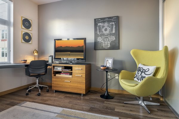 Home office with sleek design and ergonomic furniture at The Luke Apartments