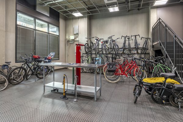 Bicycle storage area at The Luke Apartments featuring secure racks and ample space