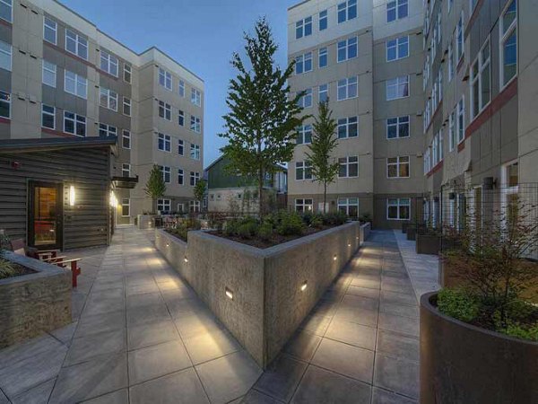 Courtyard view with lush landscaping at The Luke Apartments in Greystar luxury community