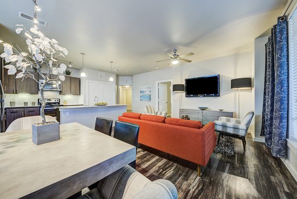 Dining room featuring modern decor and elegant lighting at Boardwalk Research Luxury Apartments
