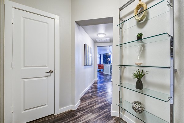 Welcoming entrance hallway with elegant decor at Boardwalk Research Luxury Apartments