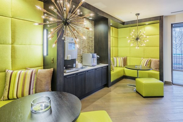 Clubhouse featuring modern furnishings and entertainment areas at 1100 South Apartments