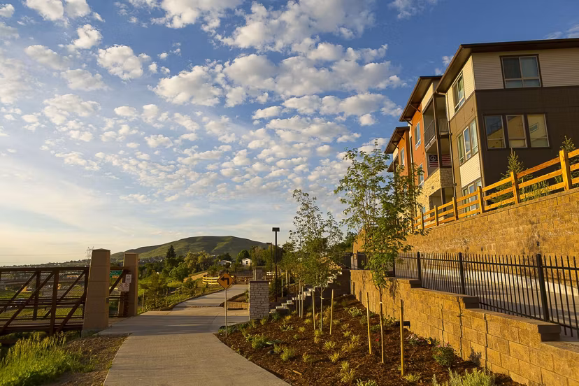 Outlook Golden Ridge Apartments signage against a clear blue sky