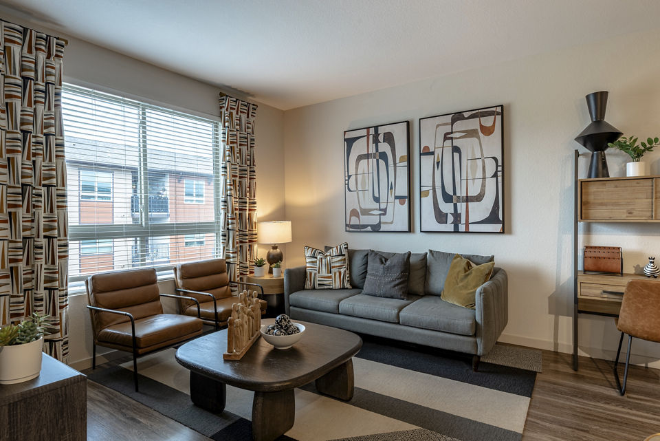 Outlook Golden Ridge Apartments: Cozy living room with modern dÃ©cor and natural light, perfect for relaxation and comfort
