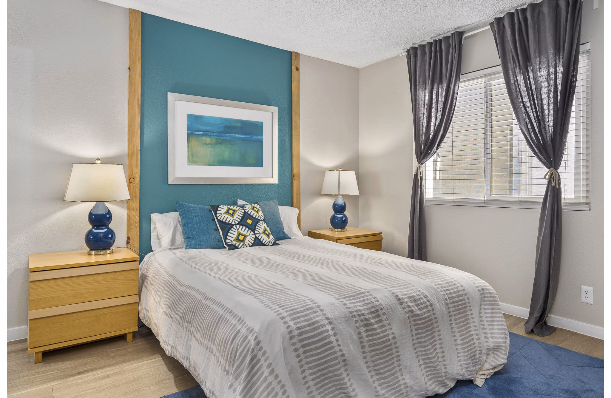 bedroom at The Cortesian Apartments
