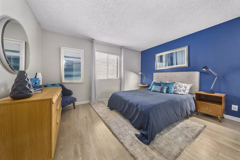 bedroom at The Cortesian Apartments