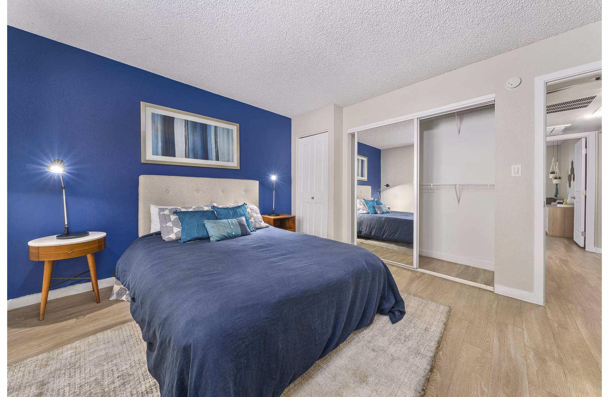 bedroom at The Cortesian Apartments