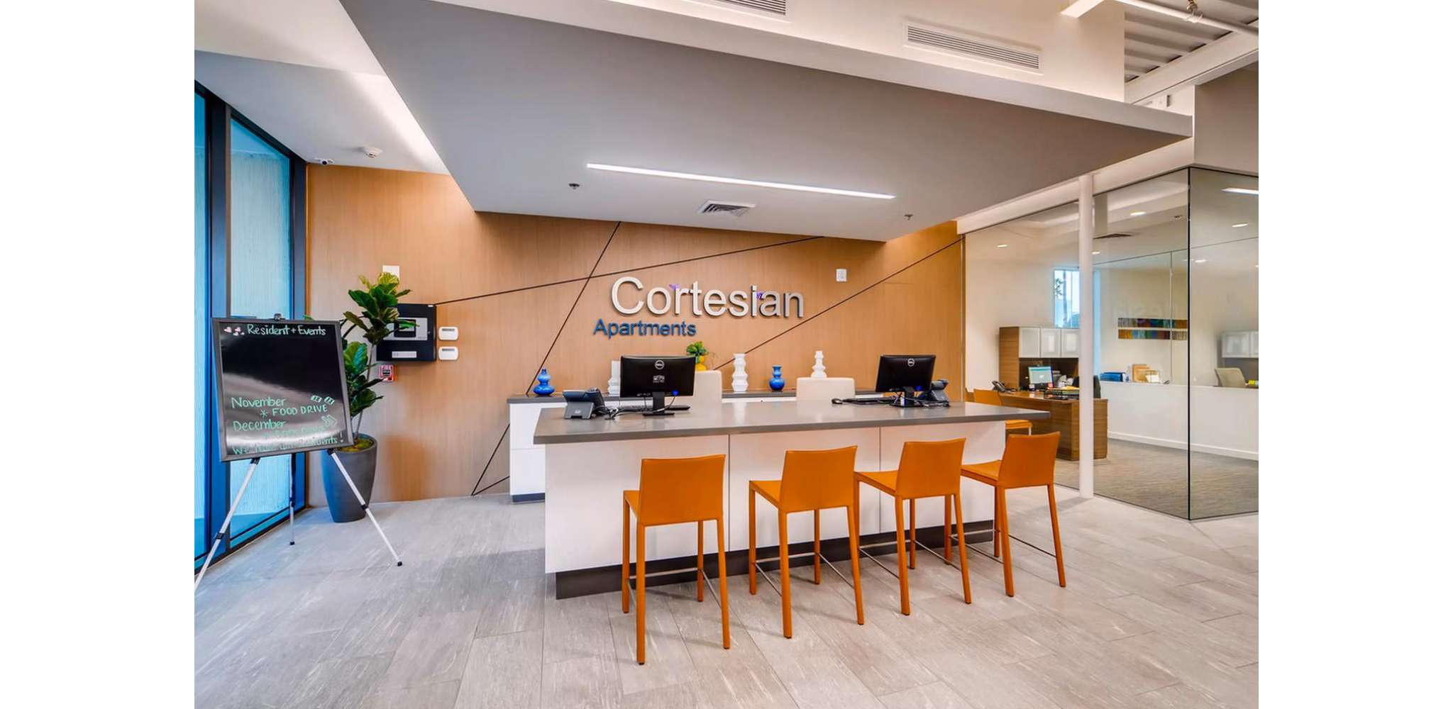 Clubhouse with modern design features at The Cortesian Apartments, a luxury Greystar property